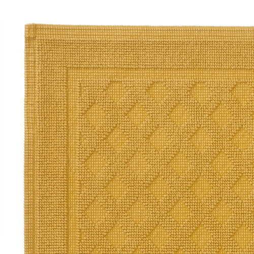 Osuna bath mat, mustard, 100% cotton | URBANARA bath mats