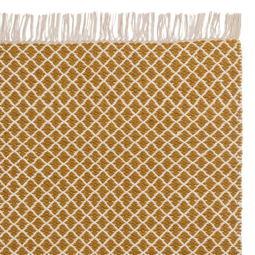 Loni rug, bright mustard & off-white, 100% wool | URBANARA wool rugs