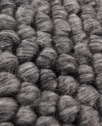 Ravi Pouffe charcoal melange, 70% wool & 30% viscose
