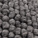 Ravi Pouffe charcoal melange, 70% wool & 30% viscose | URBANARA stools & poufs