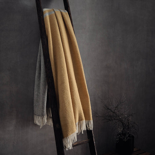 Salakas wool blanket in mustard & cream | Home & Living inspiration | URBANARA