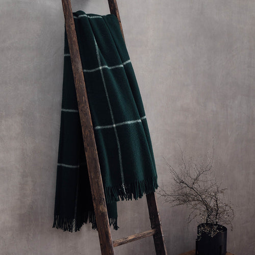 Saldus Wool Blanket in dark green & cream | Home & Living inspiration | URBANARA