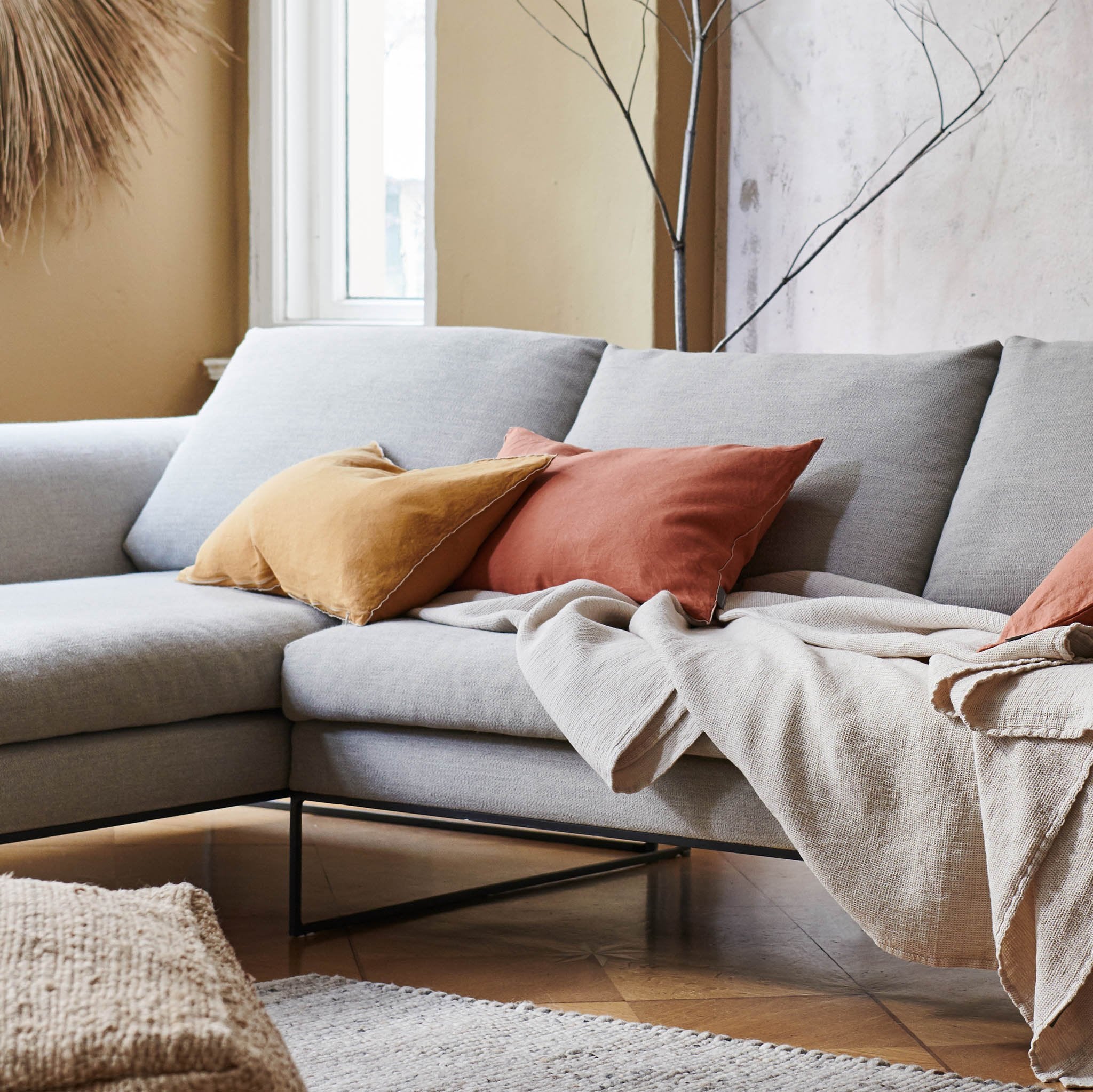 Terracotta and grey cushions top