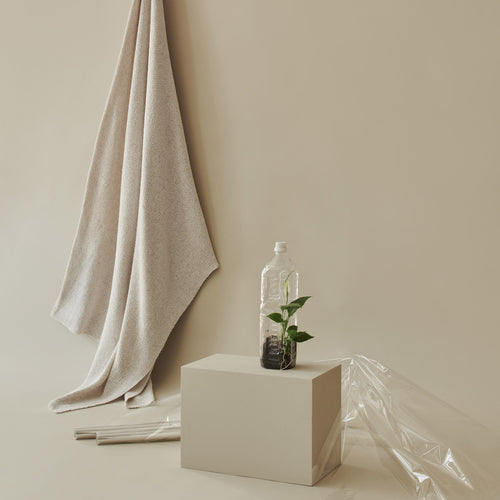Amaro Recycled Fiber Blanket in off-white melange | Home & Living inspiration | URBANARA